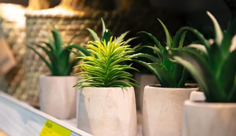 artificial-green-plant-pot-display-rack-sale_169016-43475